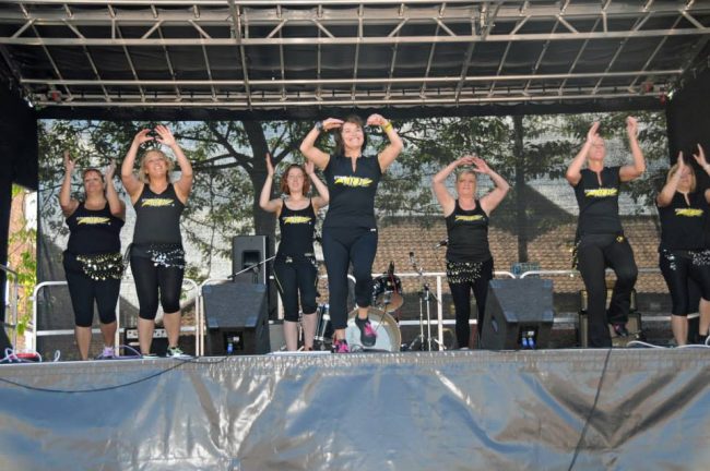 Fitness Vibe Zumba display on the main stage at Cottingham Day